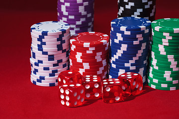 Image showing Stacks of Poker Chips with Playing Bones