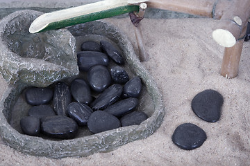 Image showing Stones and waterfall  in a Zen garden