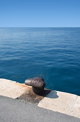 Image showing Old stone pier facing the horizon