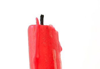 Image showing Close up of a  red candle studio isolated on white