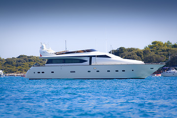 Image showing Luxury yacht in a bay on a hot summer day