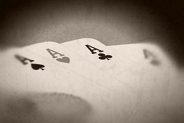 Image showing Grunge textured retro style background - Four aces