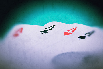 Image showing Grunge textured retro style background - Four aces