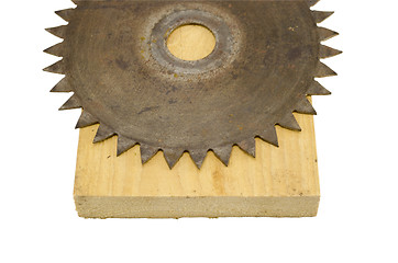 Image showing circular saw disk on wood cut board isolated white 