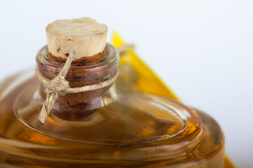 Image showing Close up of a perfume bottle on white