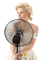 Image showing housewife with fan playing pop star