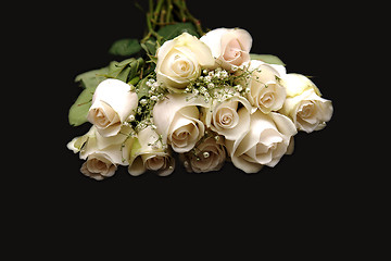 Image showing Closeup of a Dozen White Roses