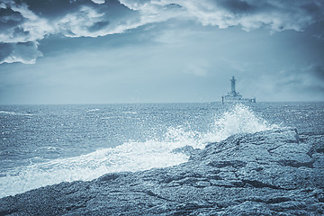 Image showing Lighthouse on a stormy day, artistic toned photo