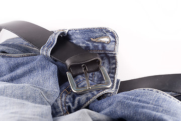 Image showing Blue jeans and a black leather belt