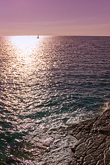 Image showing Sunset at stone beach