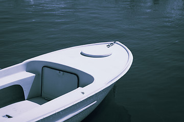 Image showing Old plastic small fishing boat in good condition