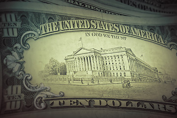 Image showing US dollars background, retro style toned photo