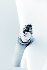 Image showing A burning cigarette