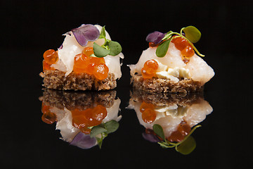 Image showing Salmon, cheese, and herbs canapes