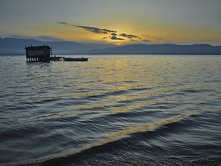 Image showing Old fishing cottage in the dawn