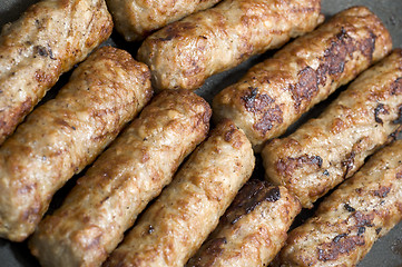 Image showing cooking sausages in a pan