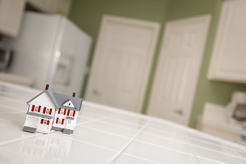 Image showing Small Model Home on Kitchen Counter of House