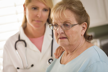 Image showing Senior Adult Woman Being Consoled by Female Doctor or Nurse