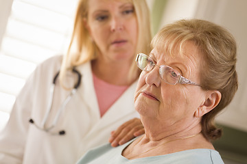 Image showing Senior Adult Woman Being Consoled by Female Doctor or Nurse