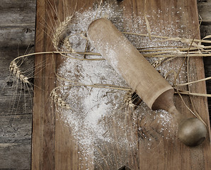 Image showing Wooden Rolling Pin, Flour And  Wheat