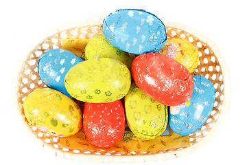 Image showing easter chocolate eggs in a basket