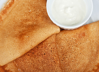 Image showing pancakes with sour cream