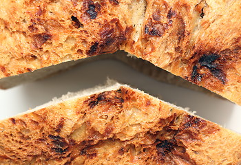 Image showing romanian traditional bread cut in two