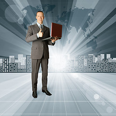 Image showing Business Man against Conceptual Background