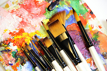 Image showing Paintbrushes and art palette