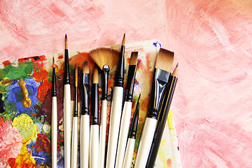 Image showing Paintbrushes and art palette