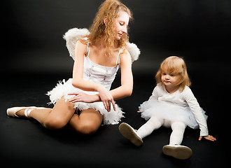 Image showing Two pretty ballerina's relaxing