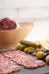 Image showing cold cut platter with pita bread and pickles