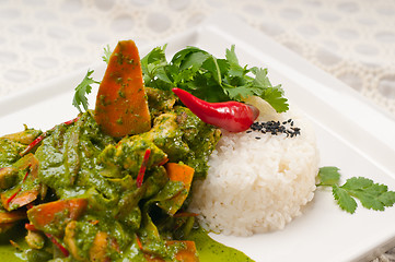 Image showing chicken with green curry vegetables and rice