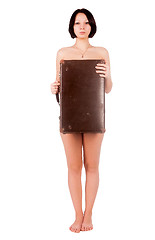 Image showing sexy nude woman covering her body by suitcase