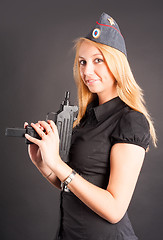 Image showing Pretty woman with a gun