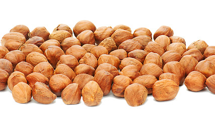 Image showing Hazelnuts background isolated on white background. 