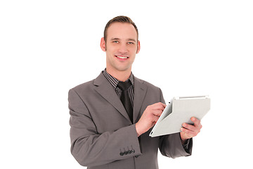 Image showing Businessman working on his tablet