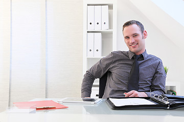 Image showing Smiling successful young businessman