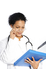 Image showing Doctor reading a patients file