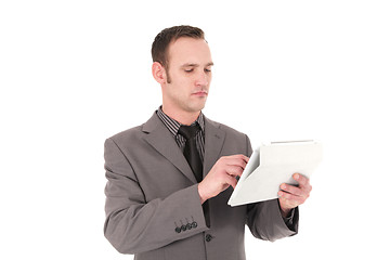 Image showing Resposible businessman working on a Pc Tablet