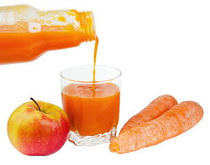 Image showing Bottle with carrots juice and an apple