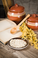 Image showing  Still life with oatmeal and an open book