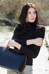 Image showing Brunette with bag