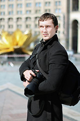 Image showing Man posing with camera