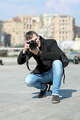 Image showing Young man with camera