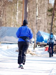 Image showing Person running on snow