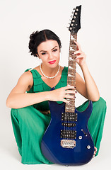 Image showing Pretty woman with guitar