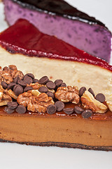 Image showing cheesecake with chocolate and nuts