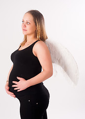 Image showing beautiful pregnant woman with angel wings