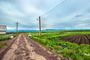 Image showing Rural road with blue sky